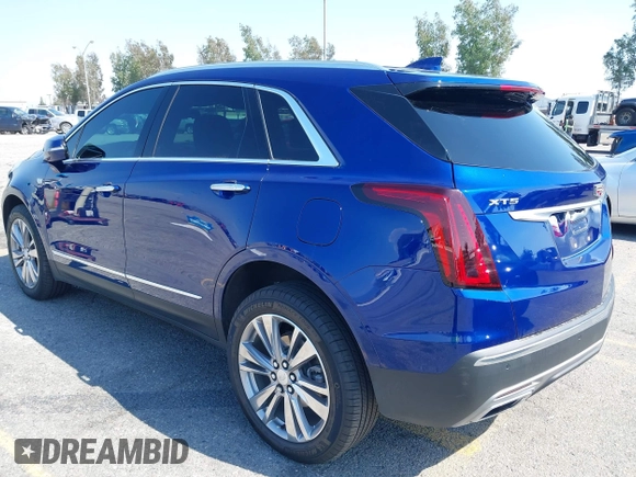 2023 Cadillac XT5 FWD Premium Luxury z VIN 1GYKNCRS3PZ176654, wystawiony jako IAAI lot #42136259 z przebiegiem 20 403 mil mil oraz . Historia ofert i sprzedaży dostępna na DreamBid. Obrazek 3.