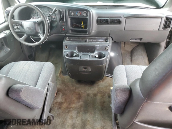 2002 GMC Savana z VIN 1GJHG39G021105787, wystawiony jako Copart lot #85583094 z przebiegiem 237 470 mil mil oraz Szkoda całkowita • Salvage title. Historia ofert i sprzedaży dostępna na DreamBid. Obrazek 8.
