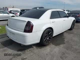 2007 Chrysler 300 C SRT8 with VIN 2C3LA73W17H659735, listed as a IAAI auction lot 41688198 with 132,785 mi miles. Bid and sale history available at carsss.com. Image 4.