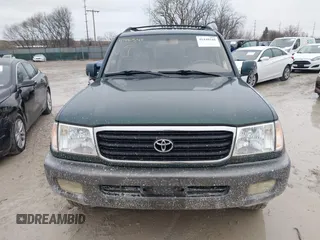 2000 Toyota Land Cruiser with VIN JT3HT05J8Y0084239, listed as a IAAI auction lot 41440548 with 240,000 mi miles. Bid and sale history available at carsss.com. Image 12.