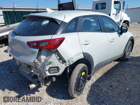 2018 Mazda CX-3 Touring z VIN JM1DKFC77J0331828, wystawiony jako IAAI lot #40482555 z przebiegiem 101 473 mil mil oraz . Historia ofert i sprzedaży dostępna na DreamBid. Obrazek 4.