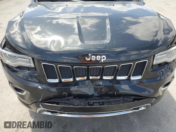 2014 Jeep Grand Cherokee Overland with VIN 1C4RJECG9EC173693, listed as a Copart auction lot 53747045 with 73,234 mi miles and Non Repairable. Bid and sale history available at carsss.com. Image 12.