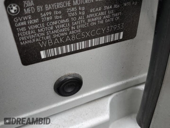 2012 BMW 7 Series 750i z VIN WBAKA8C5XCCY37933, wystawiony jako Copart lot #53122875 z przebiegiem Nie podano mil oraz Nie do naprawy • Non repairable. Historia ofert i sprzedaży dostępna na DreamBid. Obrazek 13.