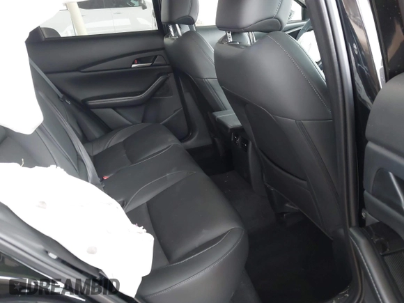 2025 Mazda CX-30 S Select Sport with VIN 3MVDMBBM3SM773819, listed as a IAAI auction lot 41584030 with 5,088 mi miles and . Bid and sale history available at DreamBid. Image 8.