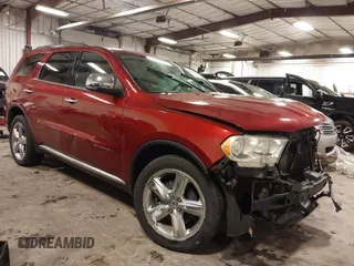 2013 Dodge Durango Citadel with VIN 1C4RDJEG8DC674957, listed as a IAAI auction lot 41598563 with 211,282 mi miles and . Bid and sale history available at carsss.com. Image 1.
