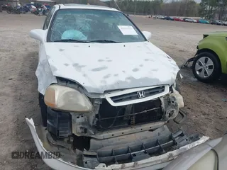 1996 Honda Civic EX with VIN 1HGEJ8249TL067640, listed as a IAAI auction lot 41863261 with 255,326 mi miles. Bid and sale history available at carsss.com. Image 13.