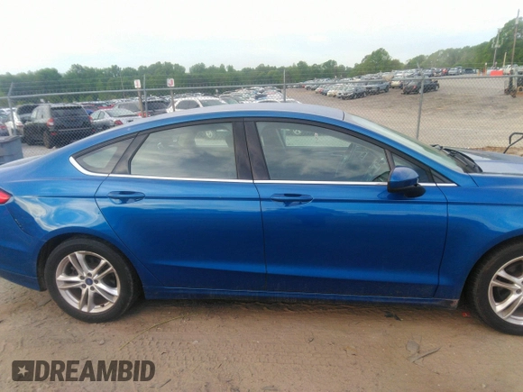 2018 Ford Fusion SE with VIN 3FA6P0HD1JR186717, listed as a IAAI auction lot 42076519 with 141,478 mi miles and . Bid and sale history available at DreamBid. Image 13.