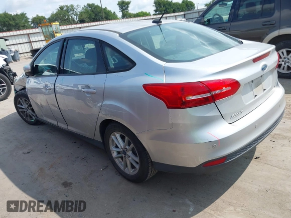 2015 Ford Focus SE z VIN 1FADP3F21FL348863, wystawiony jako IAAI lot #42401820 z przebiegiem 126 329 mil mil oraz . Historia ofert i sprzedaży dostępna na DreamBid. Obrazek 3.