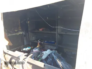 2021 Nissan NV Cargo S z VIN 1N6BF0KM1MN803526, wystawiony jako IAAI lot #41327659 z przebiegiem Nie podano mil oraz . Historia ofert i sprzedaży dostępna na DreamBid. Obrazek 8.
