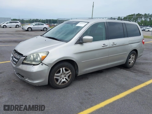 2007 Honda Odyssey EX-L z VIN 5FNRL38647B426620, wystawiony jako IAAI lot #42059093 z przebiegiem 258 622 mil mil oraz . Historia ofert i sprzedaży dostępna na DreamBid. Obrazek 2.
