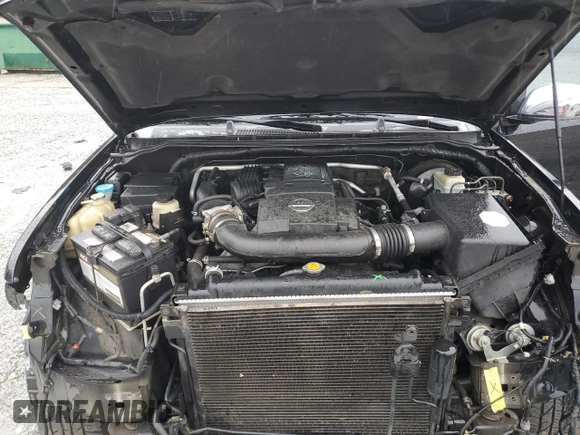 2006 Nissan Frontier LE z VIN 1N6AD07W06C448973, wystawiony jako Copart lot #48249335 z przebiegiem 192 026 mil mil oraz Szkoda całkowita • Salvage title. Historia ofert i sprzedaży dostępna na DreamBid. Obrazek 11.