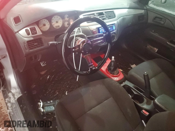 2006 Mitsubishi Lancer with VIN JA3AJ66F46U057530, listed as a Copart auction lot 87750605 with 180,243 mi miles and Salvage Title. Bid and sale history available at DreamBid. Image 8.