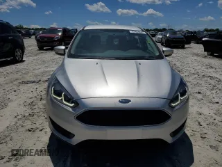 2017 Ford Focus SE with VIN 1FADP3F27HL223918, listed as a Copart auction lot 57464685 with 134,253 mi miles and Salvage title. Bid and sale history available at DreamBid. Image 5.