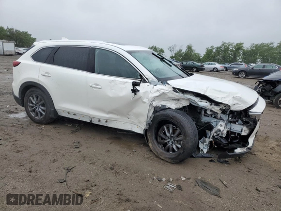 2021 Mazda CX-9 Touring with VIN JM3TCBCY1M0517709, listed as a Copart auction lot 57624945 with 64,081 mi miles and Salvage title. Bid and sale history available at DreamBid. Image 4.