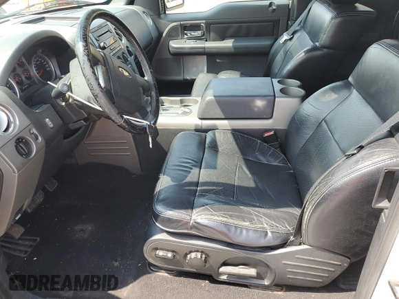2005 Ford F-150 XLT with VIN 1FTPX14515NB82307, listed as a Copart auction lot 59957895 with 179,289 mi miles and Salvage title. Bid and sale history available at DreamBid. Image 7.