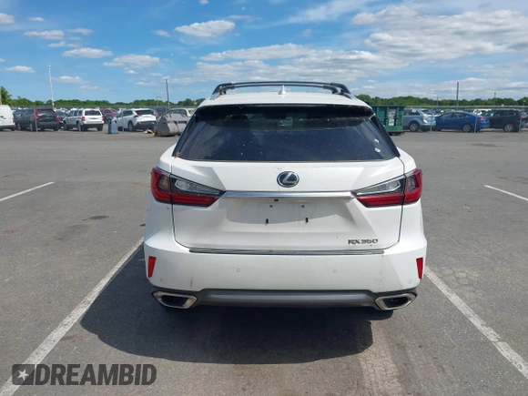 2016 Lexus RX 350 z VIN 2T2BZMCA1GC018531, wystawiony jako IAAI lot #42267497 z przebiegiem 182 473 mil mil oraz . Historia ofert i sprzedaży dostępna na DreamBid. Obrazek 16.