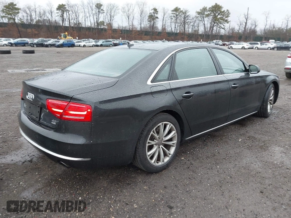 2012 Audi A8 L with VIN WAURVAFD7CN011767, listed as a IAAI auction lot 41848096 with 98,397 mi miles. Bid and sale history available at carsss.com. Image 4.