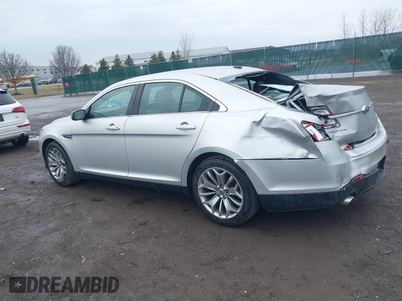 2014 Ford Taurus Limited with VIN 1FAHP2F81EG123933, listed as a IAAI auction lot 41843301 with 111,629 mi miles. Bid and sale history available at carsss.com. Image 14.
