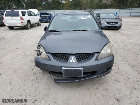 2004 Mitsubishi Lancer OZ-Rally with VIN JA3AJ86E04U029594, listed as a Copart auction lot 73143284 with 71,623 mi miles and Clean Title. Bid and sale history available at carsss.com. Image 5.