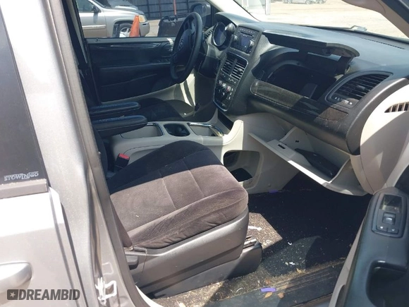 2014 Dodge Grand Caravan SXT with VIN 2C4RDGCG3ER128971, listed as a IAAI auction lot 41921386 with 255,074 mi miles. Bid and sale history available at carsss.com. Image 5.