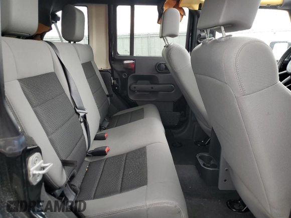 2008 Jeep Wrangler Unlimited X with VIN 1J4GA391X8L528349, listed as a Copart auction lot 57086935 with 134,061 mi miles and Salvage title. Bid and sale history available at DreamBid. Image 11.