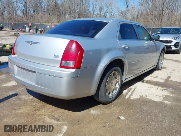 2006 Chrysler 300 Touring with VIN 2C3KA53G96H109576, listed as a IAAI auction lot 41837473 with 149,438 mi miles. Bid and sale history available at carsss.com. Image 4.