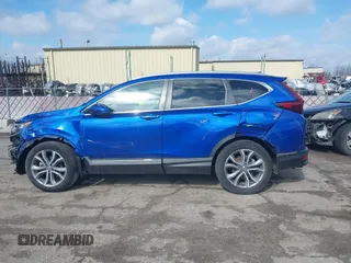 2020 Honda CR-V Touring with VIN 7FARW2H91LE012284, listed as a IAAI auction lot 41672460 with 28,207 mi miles and . Bid and sale history available at DreamBid. Image 15.
