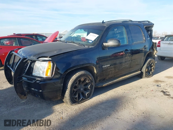 2014 GMC Yukon SLT with VIN 1GKS1CE00ER247249, listed as a IAAI auction lot 41271351 with 215,044 mi miles. Bid and sale history available at carsss.com. Image 17.