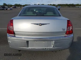 2006 Chrysler 300 C with VIN 2C3KK63H46H296625, listed as a Copart auction lot 70220974 with 104,811 mi miles and Salvage Title. Bid and sale history available at carsss.com. Image 6.