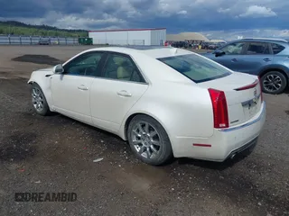 2009 Cadillac CTS AWD z VIN 1G6DT57V090104530, wystawiony jako IAAI lot #42314043 z przebiegiem 96 109 mil mil oraz . Historia ofert i sprzedaży dostępna na DreamBid. Obrazek 3.