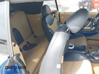 2006 MINI Convertible S with VIN WMWRH335X6TK59110, listed as a IAAI auction lot 42089085 with 101,303 mi miles and . Bid and sale history available at DreamBid. Image 8.