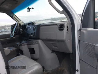 2013 Ford Econoline Cargo Commercial with VIN 1FTNE1EW2DDB11061, listed as a IAAI auction lot 41808318 with 230,677 mi miles. Bid and sale history available at carsss.com. Image 5.