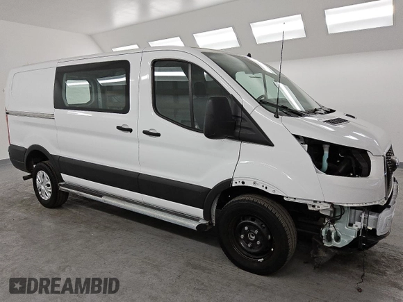 2023 Ford Transit Cargo with VIN 1FTBR1Y86PKB40356, listed as a Copart auction lot 45669345 with 12,890 mi miles and Salvage Title. Bid and sale history available at DreamBid. Image 4.