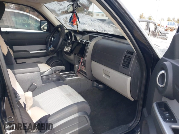 2007 Dodge Nitro SLT with VIN 1D8GU58K97W583862, listed as a IAAI auction lot 41378801 with 227,713 mi miles. Bid and sale history available at carsss.com. Image 5.