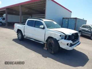 2021 Toyota Tacoma SR z VIN 3TYAX5GN6MT032845, wystawiony jako IAAI lot #41637867 z przebiegiem 16 712 mil mil oraz . Historia ofert i sprzedaży dostępna na DreamBid. Obrazek 1.