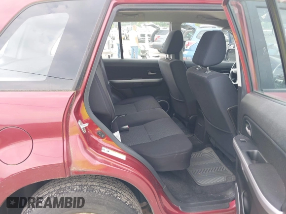 2008 Suzuki Grand Vitara w/Spare & Cargo Covers z VIN JS3TD941784101146, wystawiony jako IAAI lot #42546416 z przebiegiem 83 064 mil mil oraz . Historia ofert i sprzedaży dostępna na DreamBid. Obrazek 8.