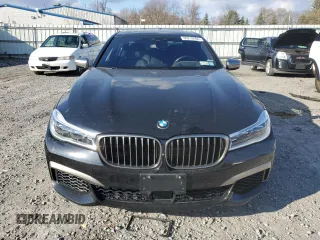 2019 BMW 7 Series M760i xDrive with VIN WBA7H6C55KG615037, listed as a Copart auction lot 80218404 with 43,405 mi miles and Salvage Title. Bid and sale history available at carsss.com. Image 5.