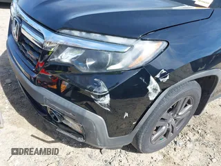 2019 Honda Ridgeline Sport with VIN 5FPYK2F12KB007990, listed as a IAAI auction lot 41828709 with 67,736 mi miles and . Bid and sale history available at DreamBid. Image 17.