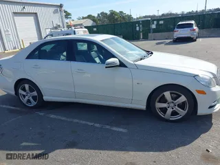 2012 Mercedes-Benz E-Class E 350 Luxury with VIN WDDHF8JB2CA619686, listed as a IAAI auction lot 42079521 with 129,025 mi miles. Bid and sale history available at carsss.com. Image 13.