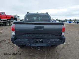 2021 Toyota Tacoma 4WD SR with VIN 3TMCZ5AN2MM406293, listed as a IAAI auction lot 41925585 with 52,243 mi miles. Bid and sale history available at carsss.com. Image 16.