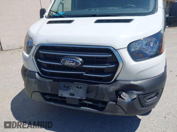 2020 Ford Transit Cargo with VIN 1FTBW3X86LKA66775, listed as a IAAI auction lot 42241856 with 66,985 mi miles and . Bid and sale history available at DreamBid. Image 6.