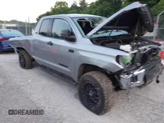 2020 Toyota Tundra SR with VIN 5TFUY5F1XLX876383, listed as a IAAI auction lot 42632195 with 69,458 mi miles and . Bid and sale history available at DreamBid. Image 1.