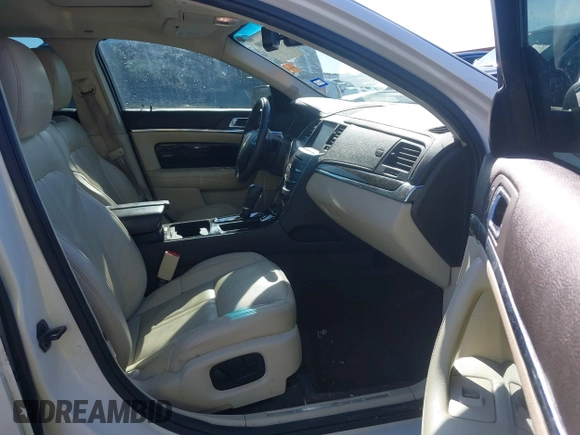 2013 Lincoln MKS with VIN 1LNHL9DK4DG605058, listed as a IAAI auction lot 41068489 with 101,801 mi miles. Bid and sale history available at carsss.com. Image 5.