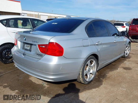 2010 BMW 3 Series 328i with VIN WBAPH7G58ANM48263, listed as a IAAI auction lot 41895524 with 99,771 mi miles and . Bid and sale history available at carsss.com. Image 4.