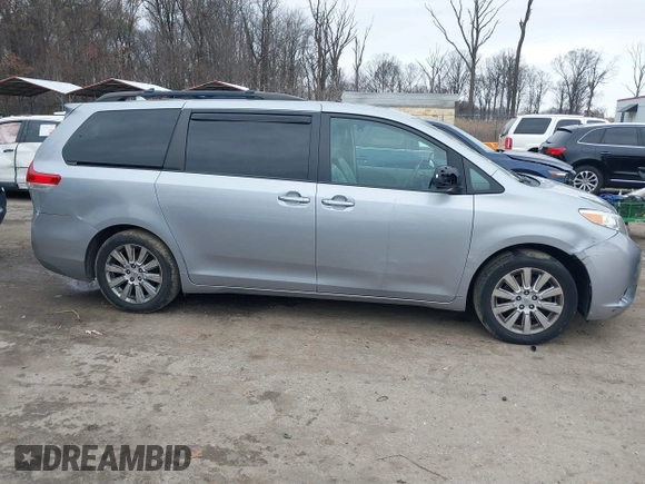 2012 Toyota Sienna XLE with VIN 5TDDK3DC7CS037579, listed as a IAAI auction lot 41080620 with 158,843 mi miles. Bid and sale history available at carsss.com. Image 14.