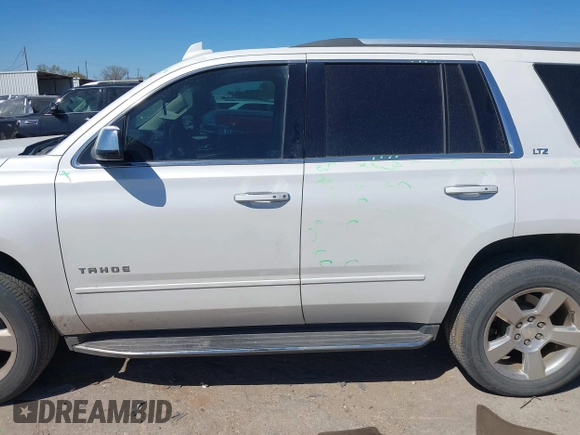 2016 Chevrolet Tahoe LTZ with VIN 1GNSCCKC1GR404754, listed as a IAAI auction lot 41831879 with 139,681 mi miles and . Bid and sale history available at DreamBid. Image 14.