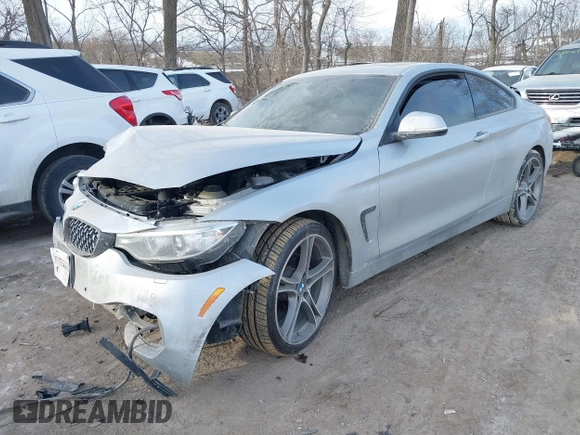 2015 BMW 4 Series 428i xDrive with VIN WBA3N9C53FK247985, listed as a IAAI auction lot 41395534 with 76,856 mi miles and . Bid and sale history available at DreamBid. Image 6.