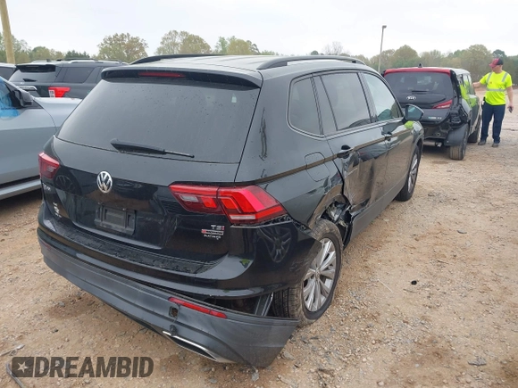 2018 Volkswagen Tiguan S with VIN 3VV0B7AX4JM098495, listed as a IAAI auction lot 41937757 with 179,168 mi miles and . Bid and sale history available at DreamBid. Image 4.