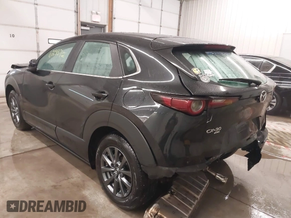 2021 Mazda CX-30 S with VIN 3MVDMBAL2MM265207, listed as a IAAI auction lot 41566325 with 62,587 mi miles and . Bid and sale history available at carsss.com. Image 3.