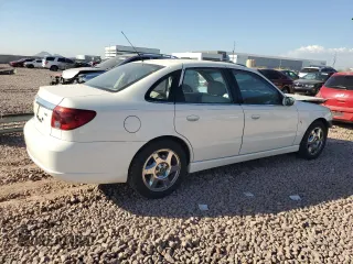 2005 Saturn L with VIN 1G8JD54RX5Y506484, listed as a Copart auction lot 83561344 with 73,594 mi miles and Salvage Title. Bid and sale history available at carsss.com. Image 3.